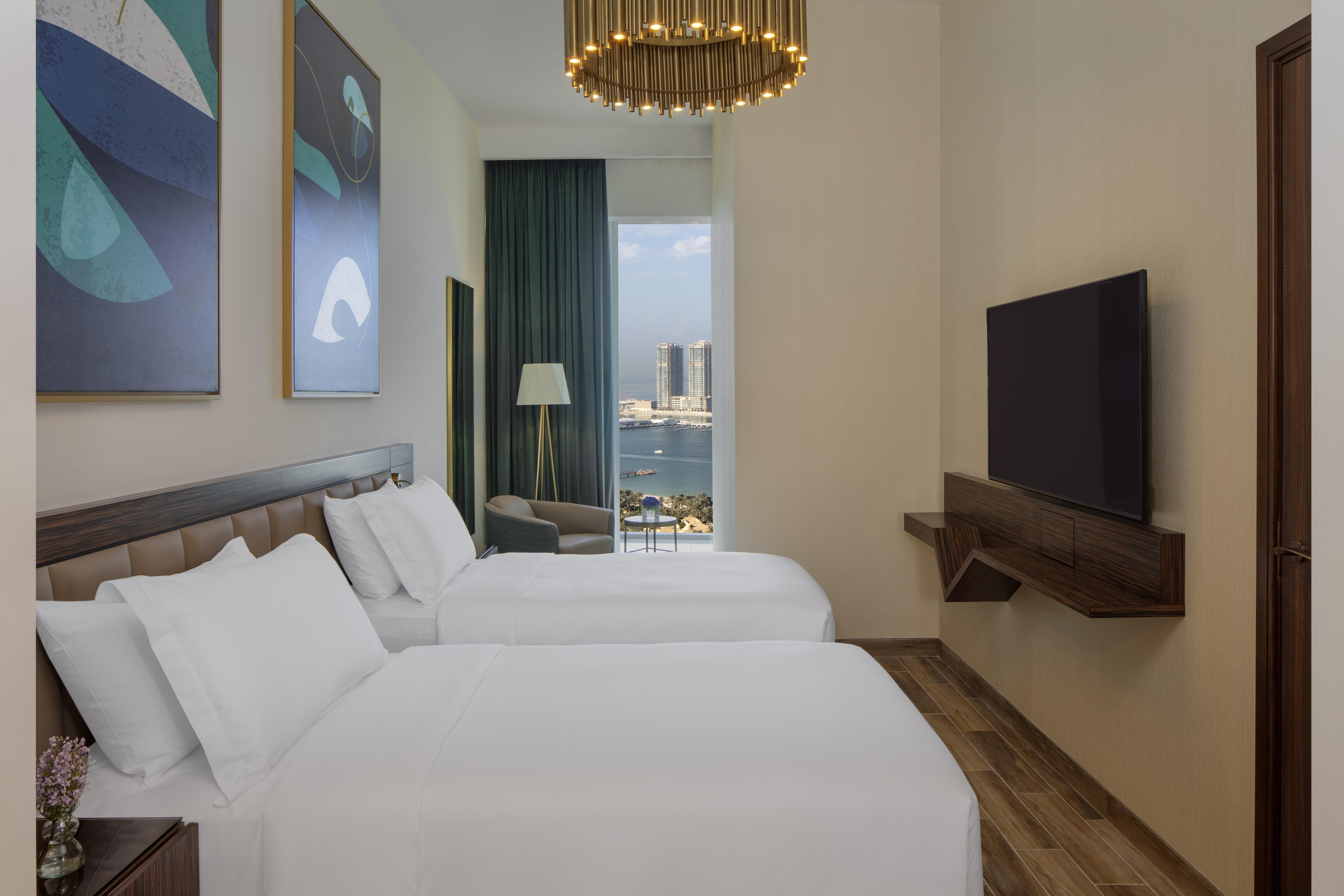 Avani Plus Palm View Dubai Hotel & Suites Exterior photo A guest room at the hotel