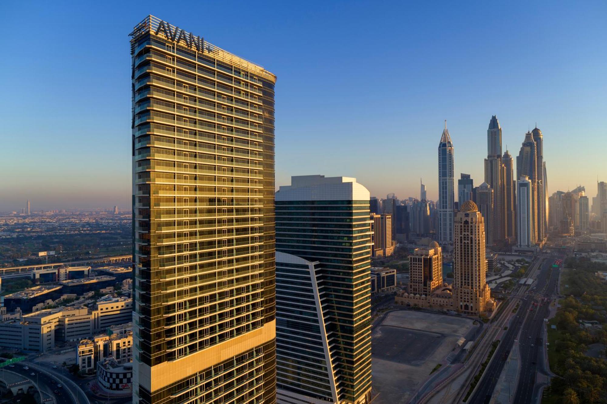 Avani Plus Palm View Dubai Hotel & Suites Exterior photo The Address Downtown Dubai